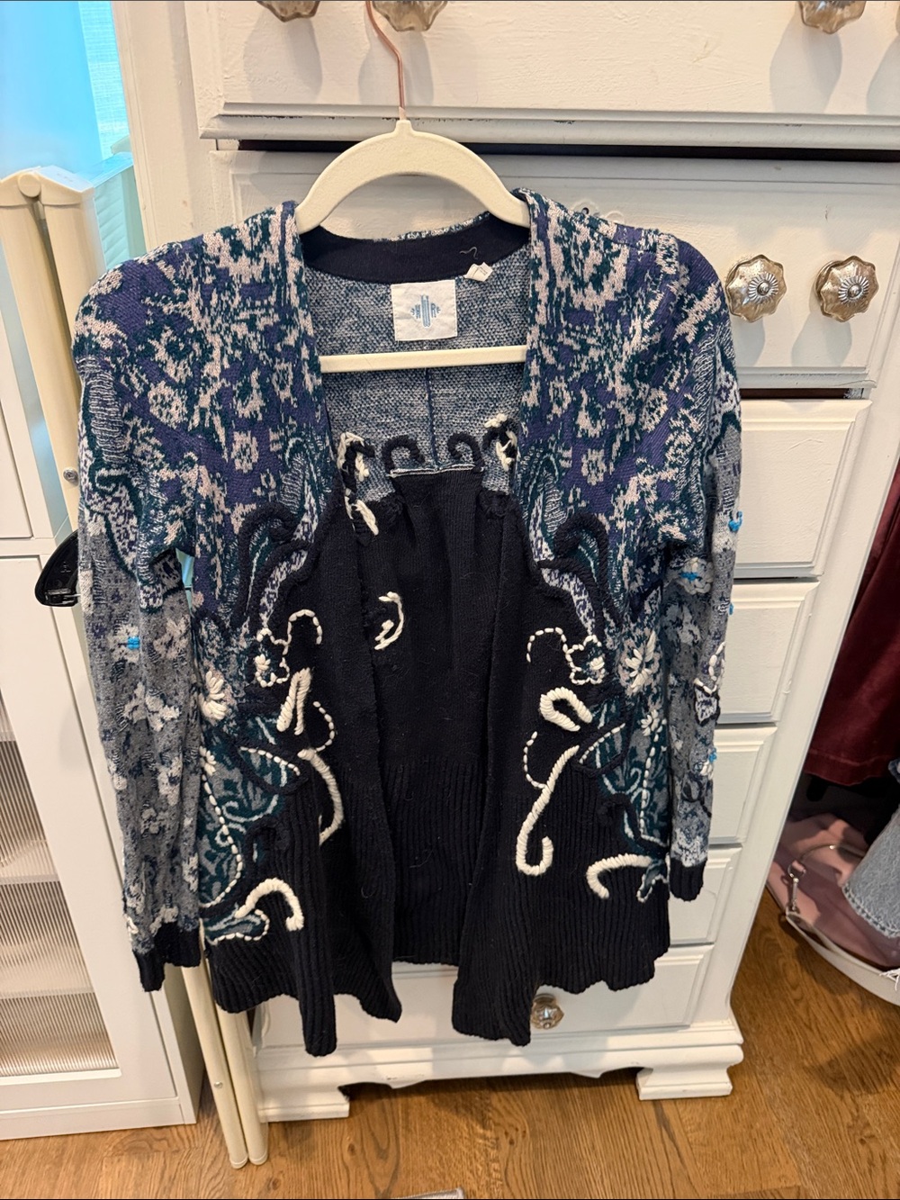 Anthropologie navy blue and teal patterned open-front cardigan